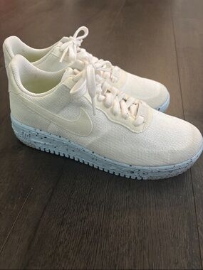 Nike White Knit Low-Top Sneakers with Light Blue Speckle Sole